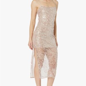 NWT MEDIUM Embellished with sparkly jewels, this dress from ASTR the Label .